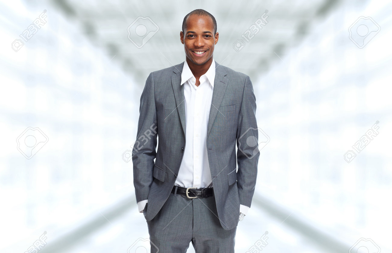 45615645-African-American-Businessman-over-office-background-Stock-Photo.jpg