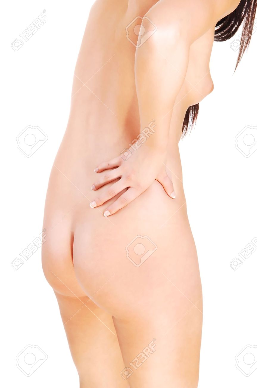 Una Mujer Desnuda De Pie Y La Celebración De Su Espalda Para El Dolor Y Su Buen  Trasero Y Senos Pequeños Están Expuestos. Fotos, retratos, imágenes y  fotografía de archivo libres de