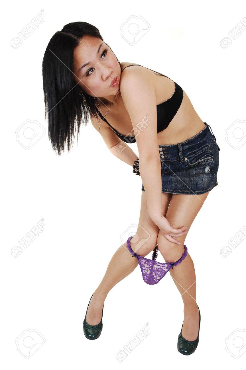 A Young Pretty Asian Woman With A Bra And Mini Skirt Loosing Her Lilac Lace  Panties And Is Very Upset, Over White Background. Stock Photo, Picture and  Royalty Free Image. Image 7157384.