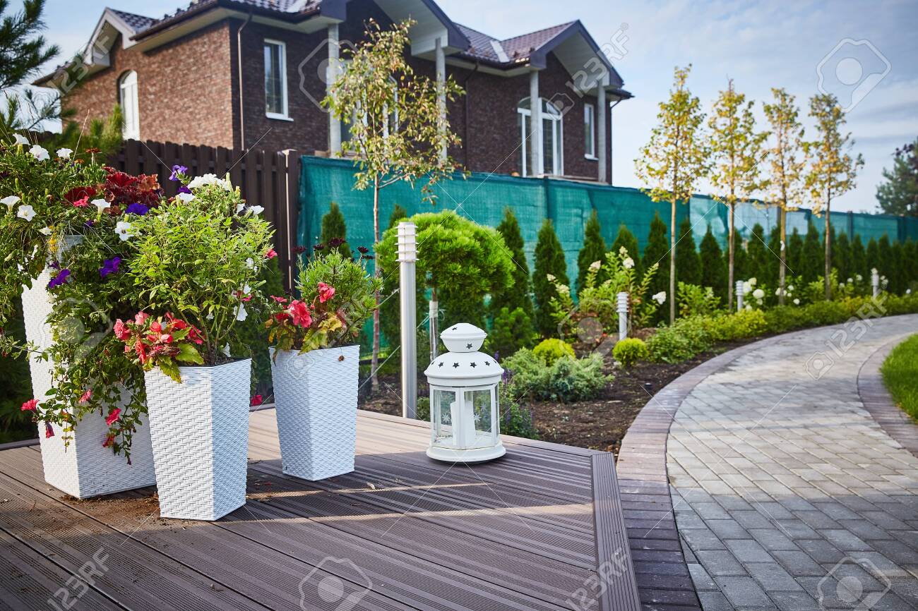 Vases With Flowers In The Garden Landscape Design Stock Photo Picture And Royalty Free Image Image 137482217