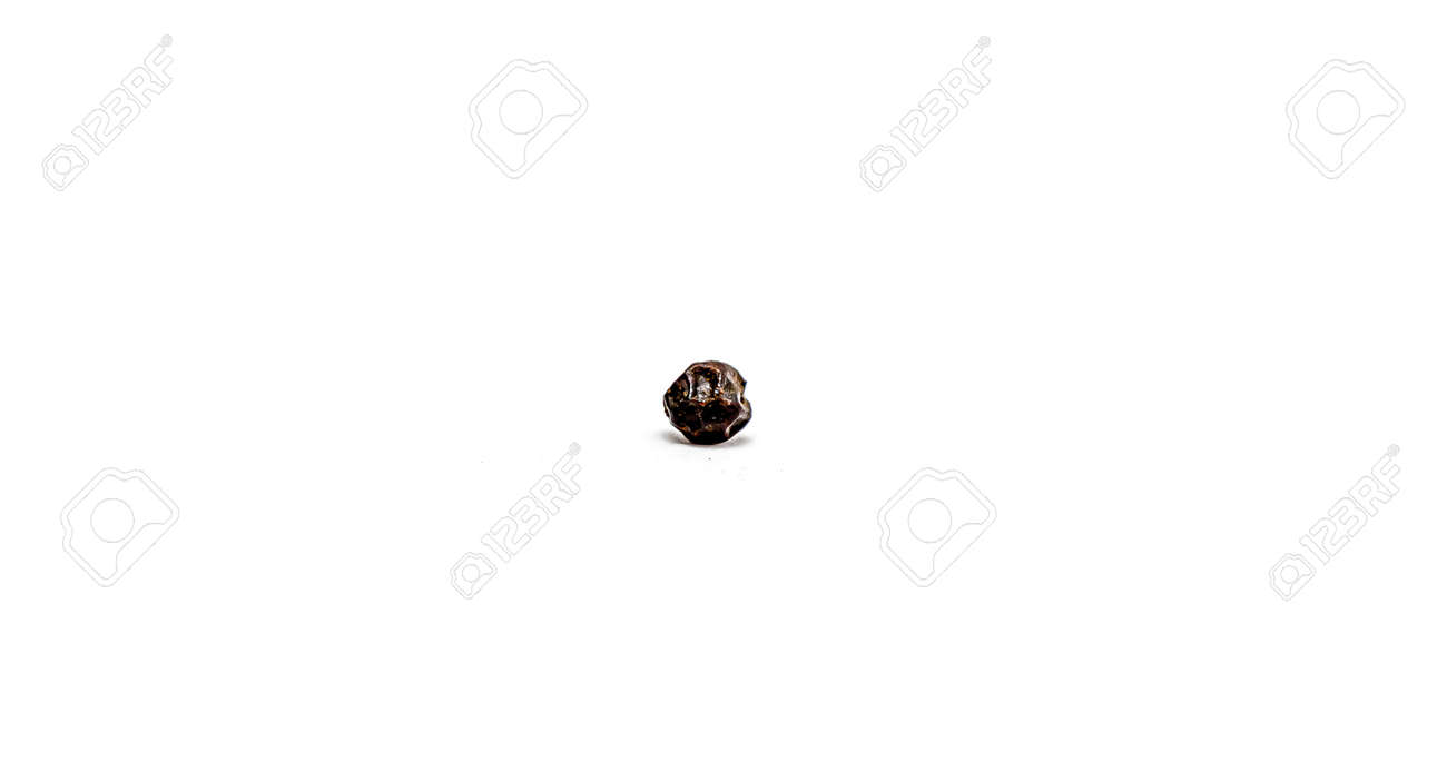 Peas of black allspice close-up on a white background. - 155722714 Peas of black allspice close-up on a white background. - 155722714