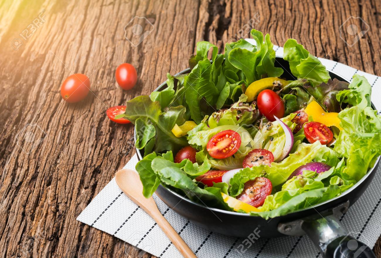 Fresh Vegetable Or Organic Vegetable Salad On Old Wooden Background With  Copy Space. Stock Photo, Picture and Royalty Free Image. Image 60240527., image size:1300x880