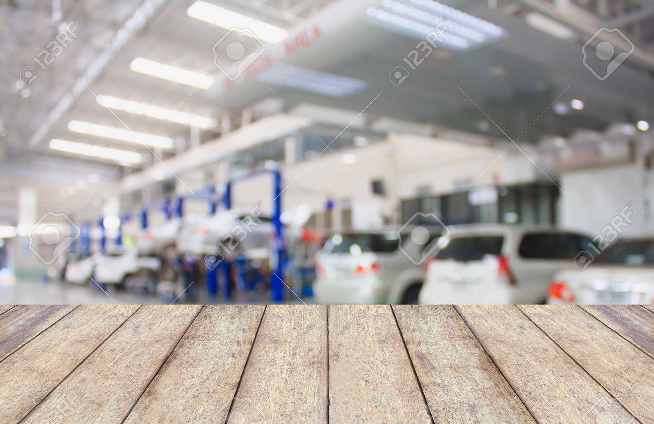 Wood Table Top With Blur Garage Background For Product Display Stock Photo Picture And Royalty Free Image Image 63856307 Find the perfect garage background stock photos and editorial news pictures from getty images. wood table top with blur garage background for product display