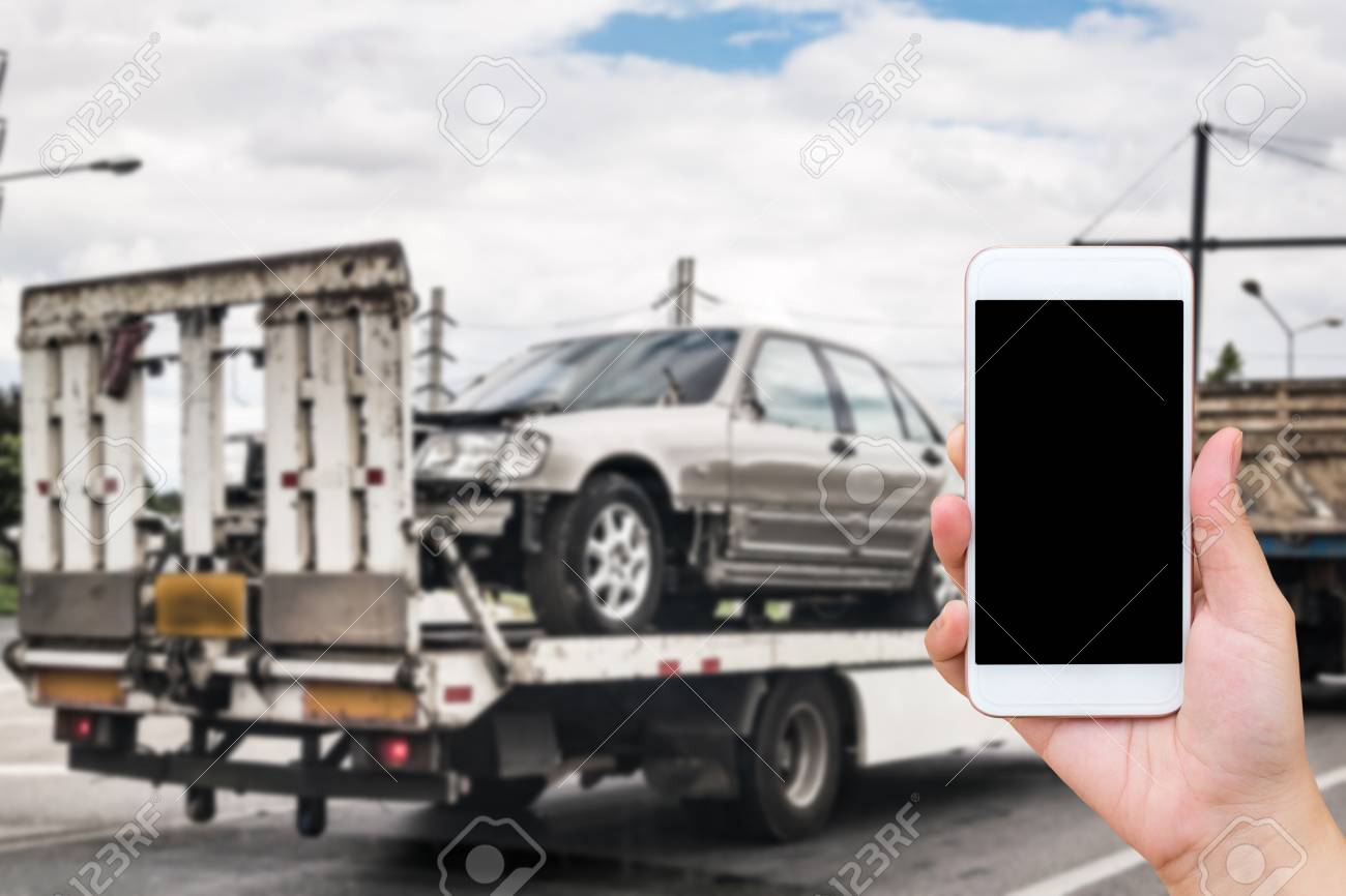Emergency Roadside Service >> Hand Using Mobile Smartphone For Emergency Roadside Service With Emergency Roadside Service >> Hand Using Mobile Smartphone For Emergency Roadside Service With
