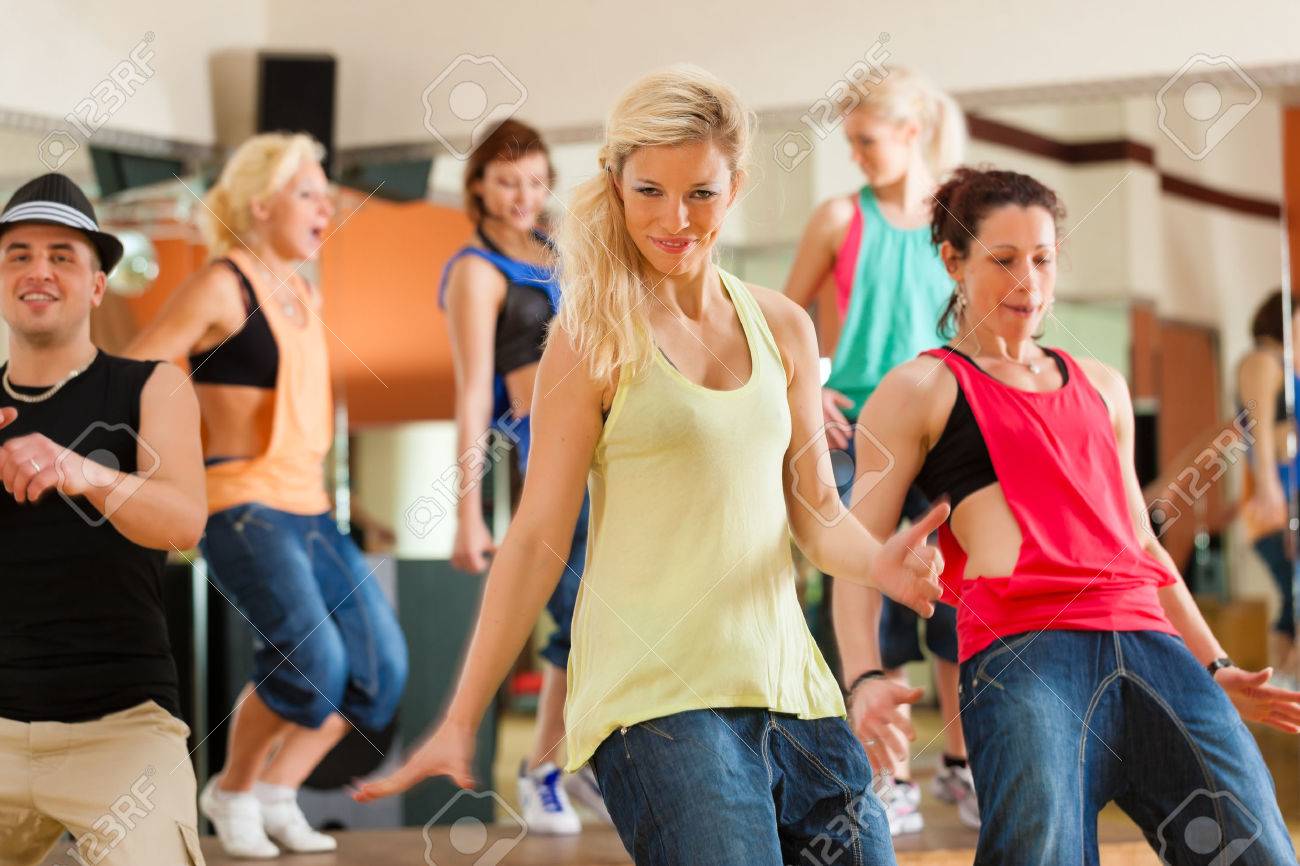 Jazzdance - young people dancing in a studio or gym doing sports or practicing a dance number - 26361320 Jazzdance - young people dancing in a studio or gym doing sports or practicing a dance number - 26361320