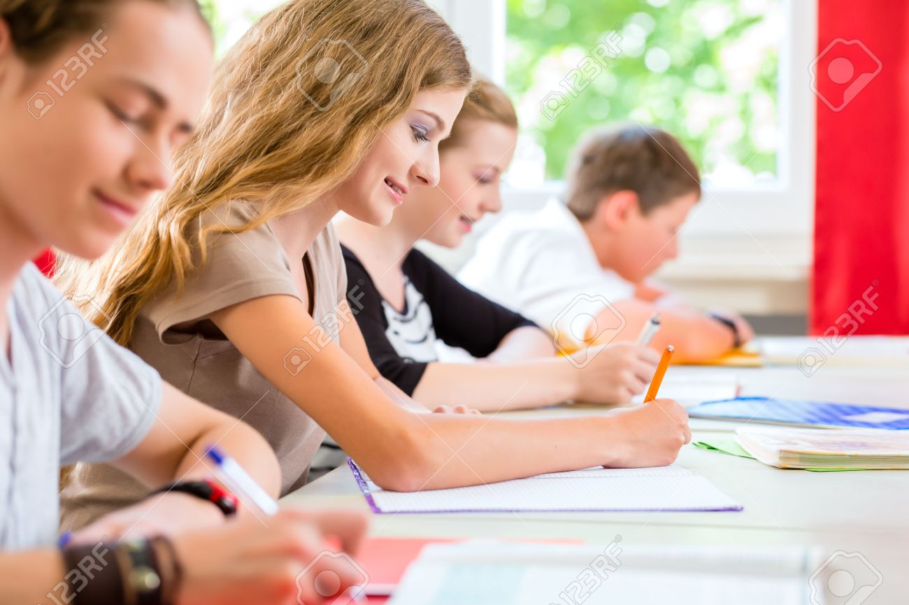 test exam writing Students pupils an or of class in school classroom.. exam or in classroom.. test school class Students writing pupils an of