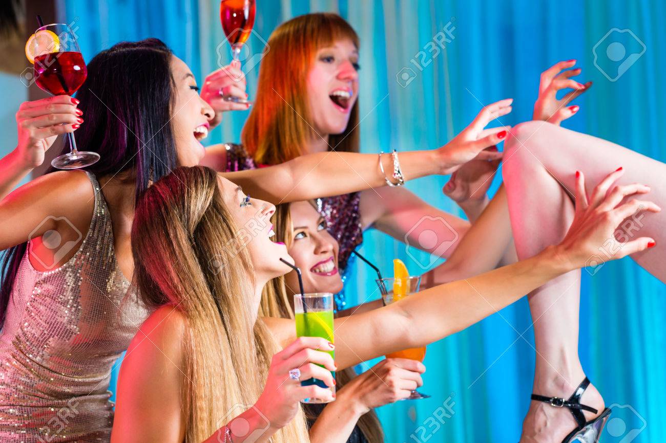 Drunk Girls With Fancy Cocktails In