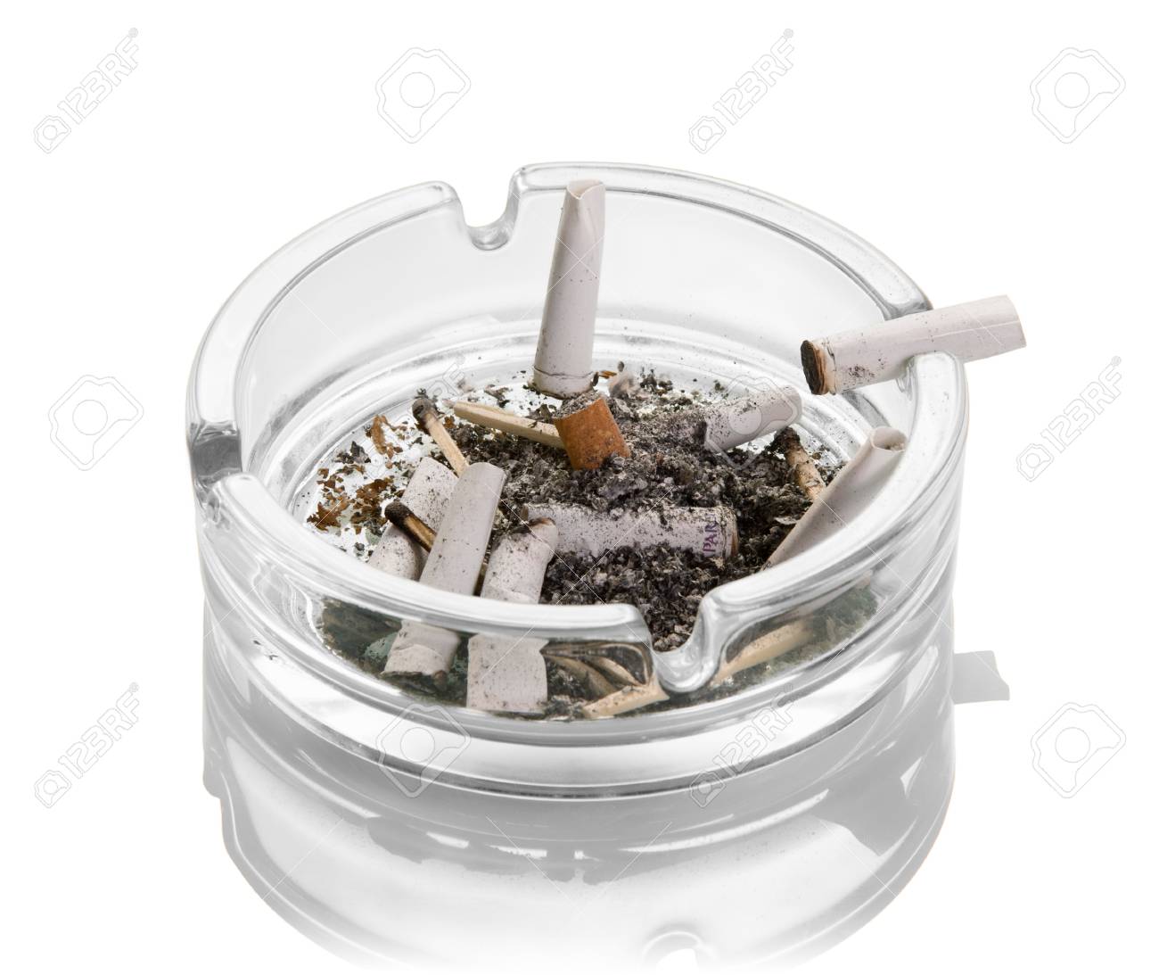 Cigarette butts, ashes, burnt matches in a glass ashtray isolated on white background. Close-up - 90684623 Cigarette butts, ashes, burnt matches in a glass ashtray isolated on white background. Close-up - 90684623