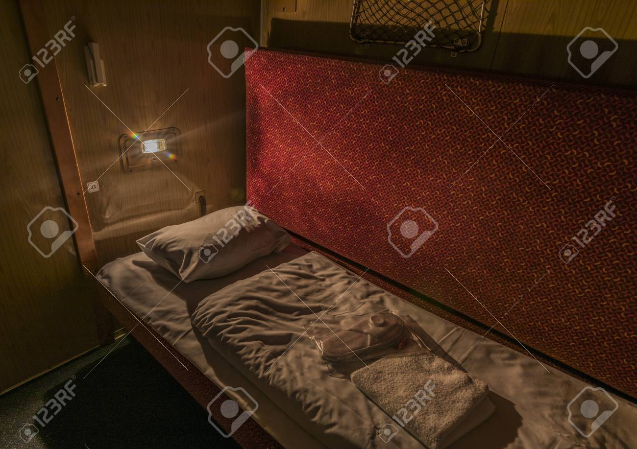 Man Sleeping In Night Train From Prague To Kosice With Beds And
