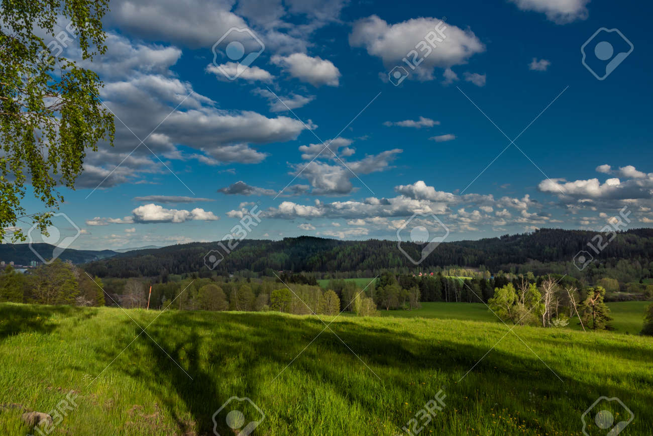 Evening with sunset near Nejdek town with fresh green pasture land after night rain - 169616548 Evening with sunset near Nejdek town with fresh green pasture land after night rain - 169616548
