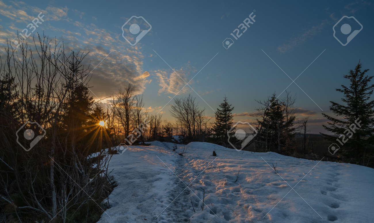 Sunset view from Bukovec hill with blue sky and orange color sun - 169616805 Sunset view from Bukovec hill with blue sky and orange color sun - 169616805