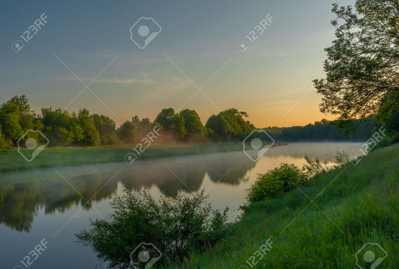 Vltava river near Budweis city in south Bohemia in sunrise fresh morning - 169616808 Vltava river near Budweis city in south Bohemia in sunrise fresh morning - 169616808