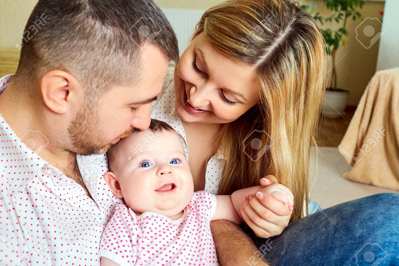 mom and dad with baby