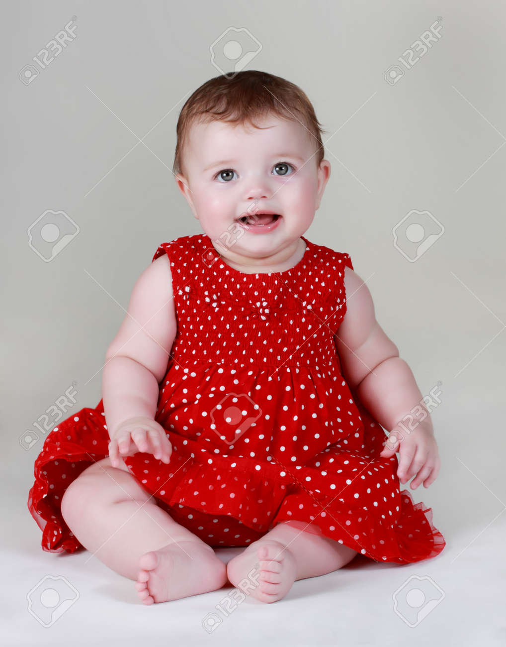 Cute Caucasian Baby Girl Wearing Red Dress Stock Photo, Picture ...