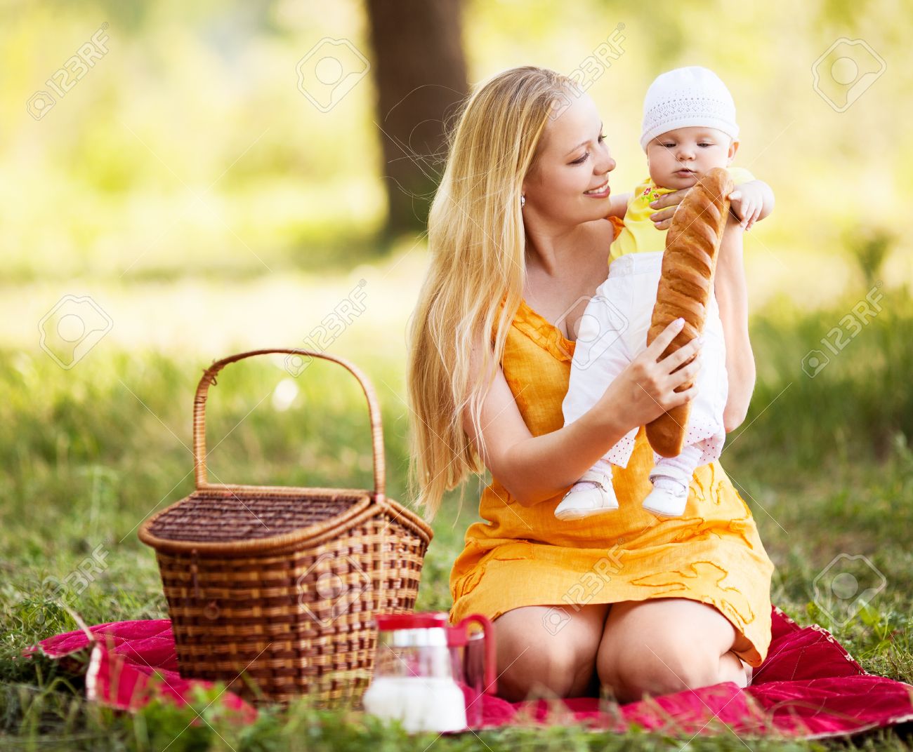 Young Mother And Baby Having A Picnic Outdoor On A Warm Summer Day Stock Photo Picture And Royalty Free Image Image