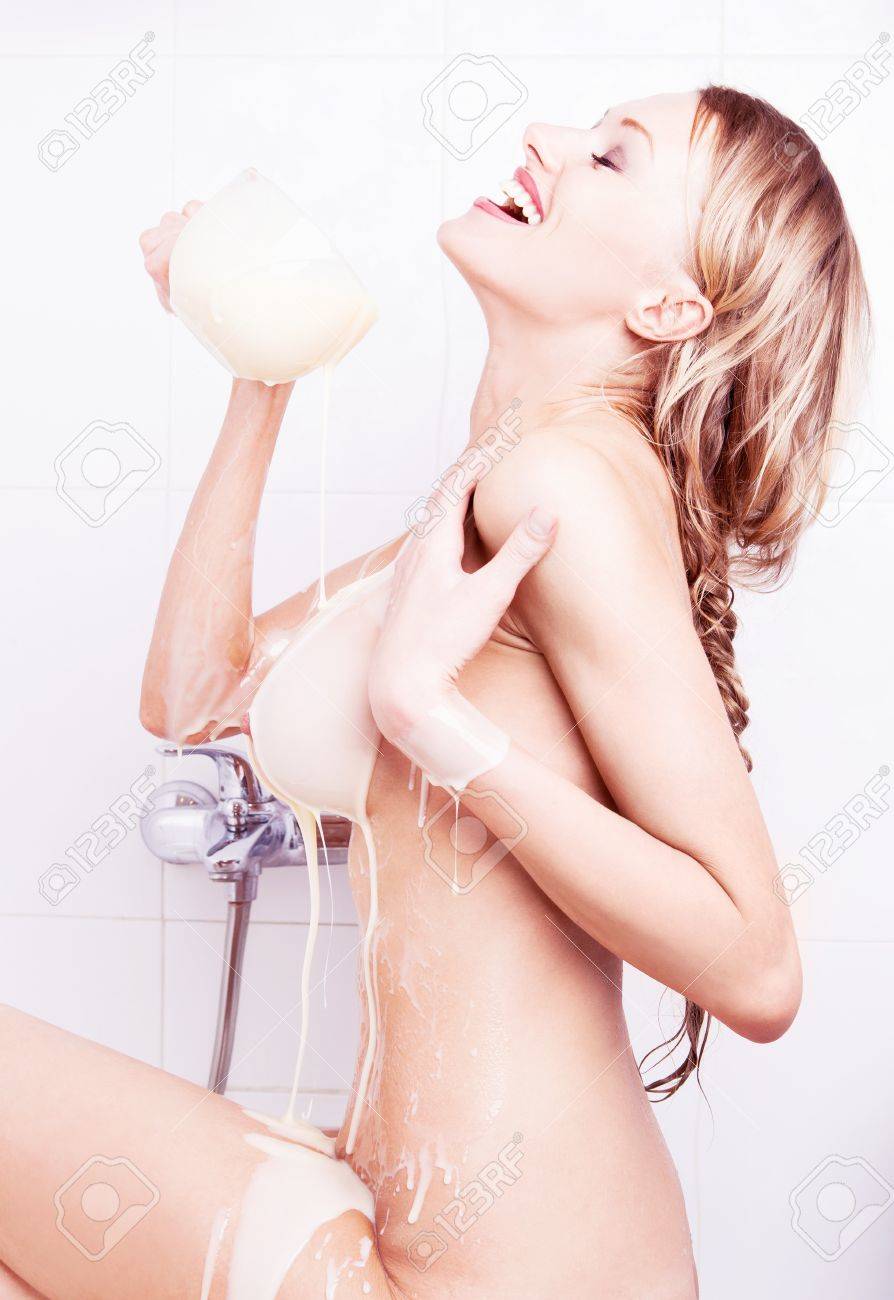 Sexy Young Nude Blond Woman Pouring Condensed Milk On Her Body Stock Photo,  Picture and Royalty Free Image. Image 16890521.