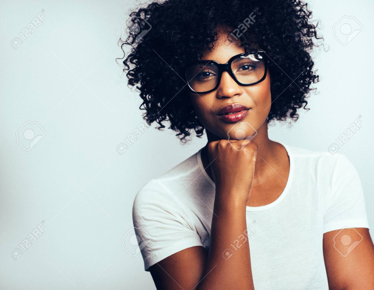 Attractive Young African Women With Curly Hair And Glasses