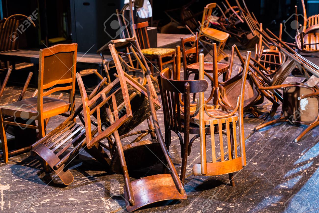 old broken furniture a pile of wooden wreckage of the chairs