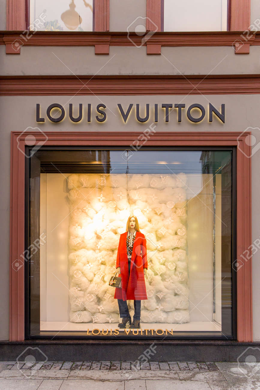 SAINT PETERSBURG, RUSSIA - NOVEMBER 24, 2020: Show Window Of Louis Vuitton  Fashion Store, Decorated In Christmas Style With Bright Golden Lights.  Boutique Shop In Saint Petersburg, Russia. Stock Photo, Picture and, image size:867x1300