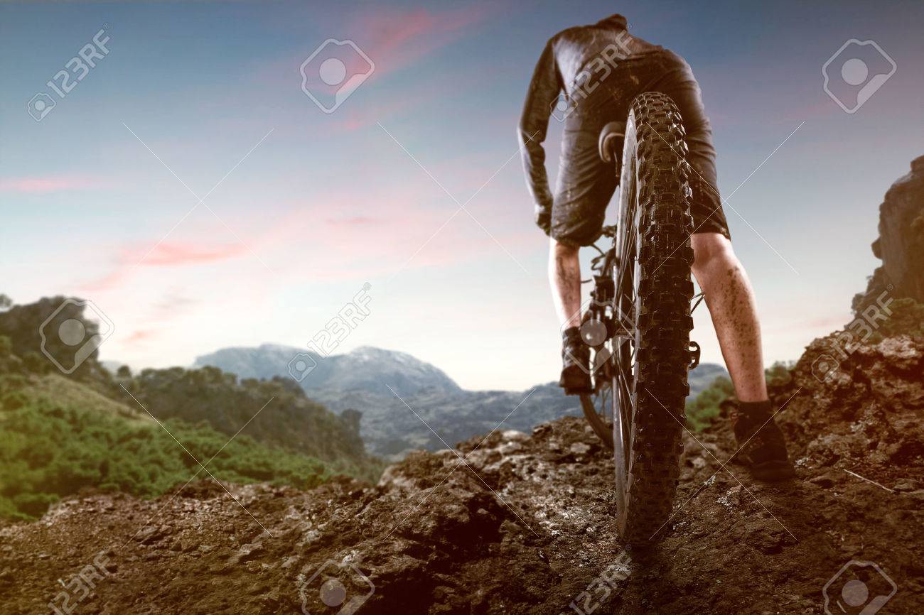 Mountainbiker in the Mountains - 77030897 Mountainbiker in the Mountains - 77030897