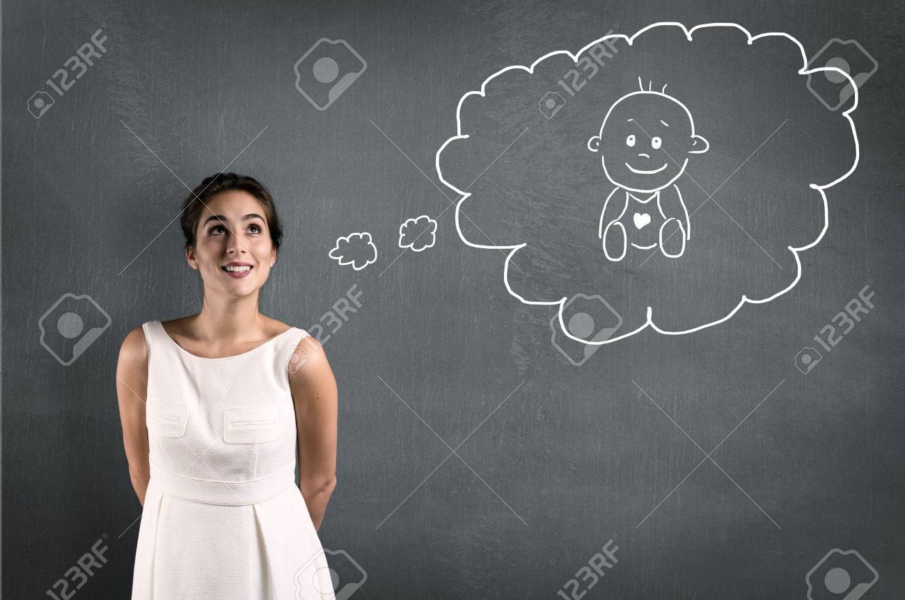 Woman thinking about a baby in a thought bubble - 79299185 Woman thinking about a baby in a thought bubble - 79299185