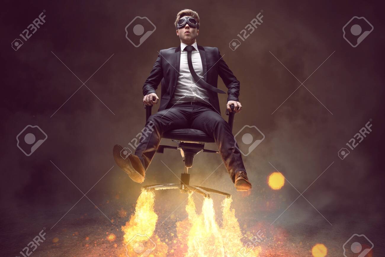 Man With Rocket Chair Stock Photo 