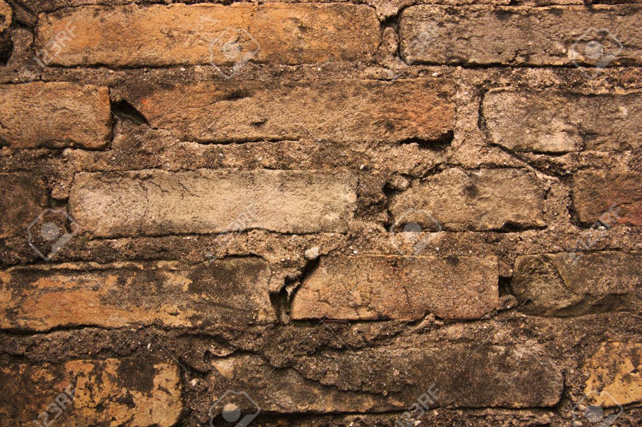old brown brick wall background texture abstract pattern of stock