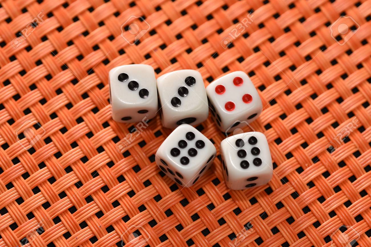 five dice on orange background stock photo picture and royalty free