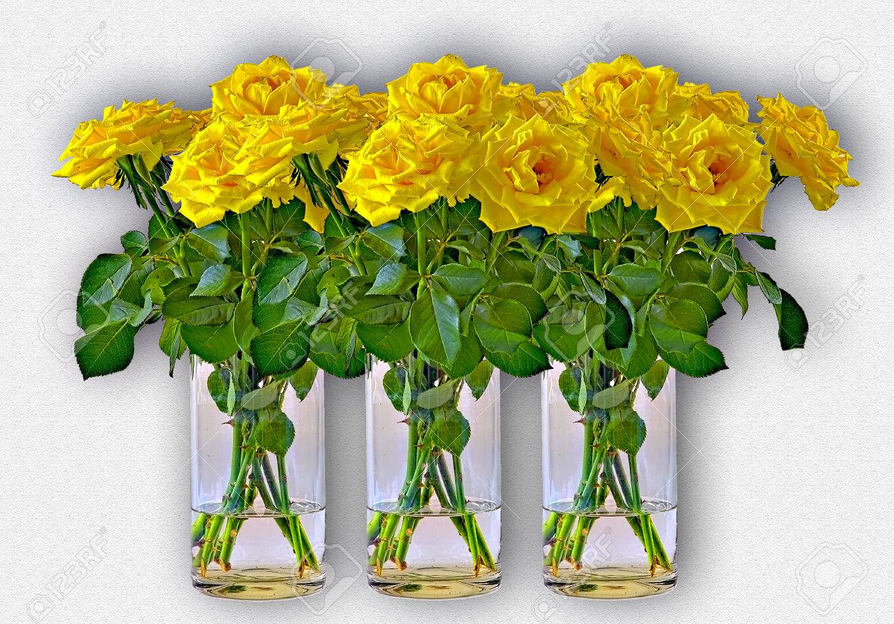 Three Yellow Bunches Of Roses In Vases Of Glass Stock Photo