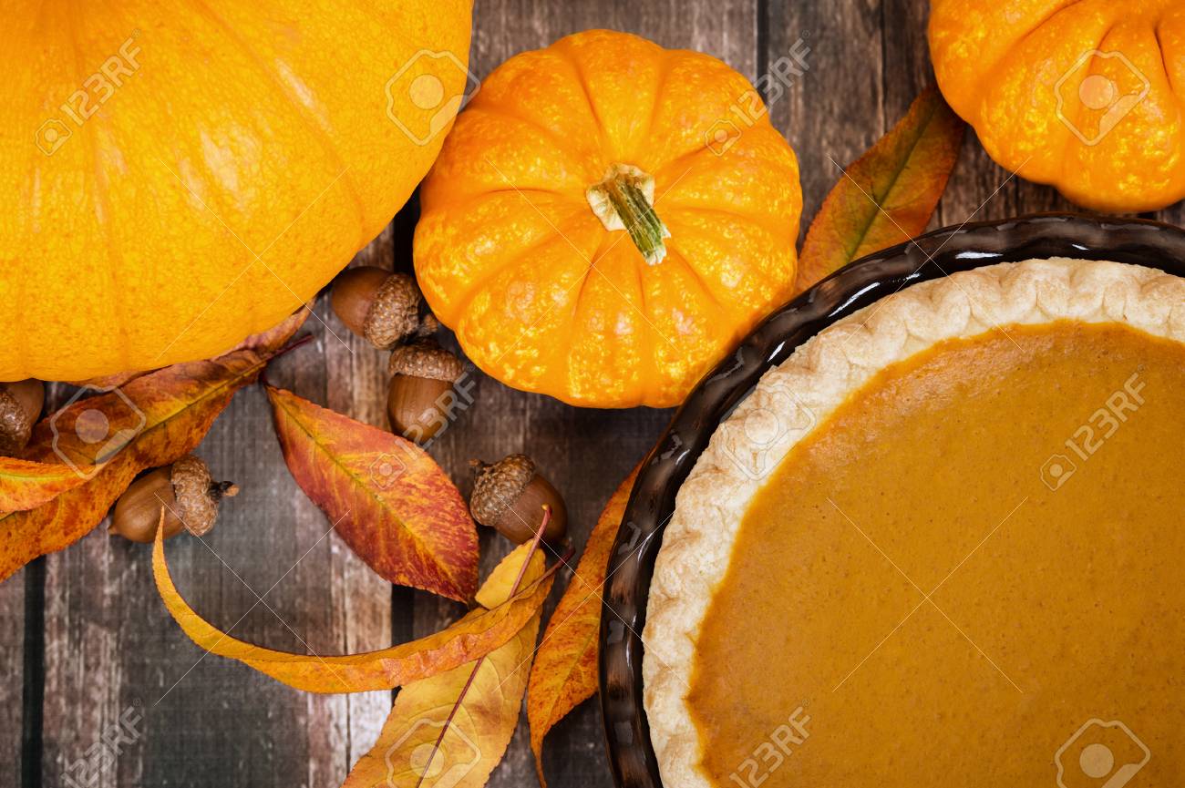 pumpkin pie with pumpkins