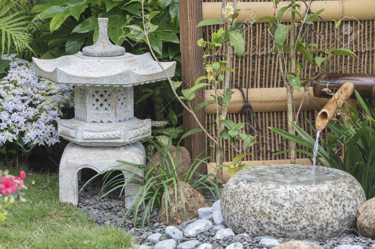 Stock Photo Stone Lantern And Bamboo Fountain In Japanese Garden Stock Photo Stone Lantern And Bamboo Fountain In Japanese Garden