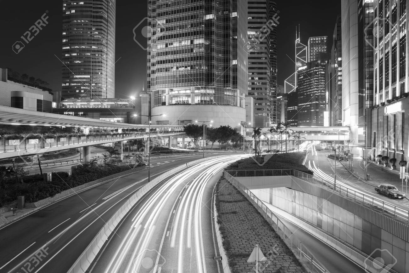 Traffic in downtown of Hong Kong city at night - 135690754 Traffic in downtown of Hong Kong city at night - 135690754