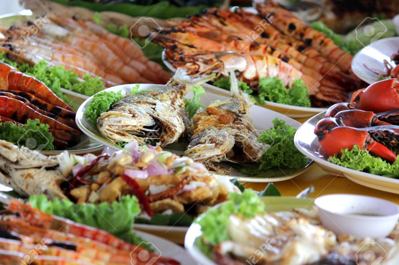 Many Kind Of Sea Food On Dining Table For Dinner Stock Photo Picture And Royalty Free Image Image