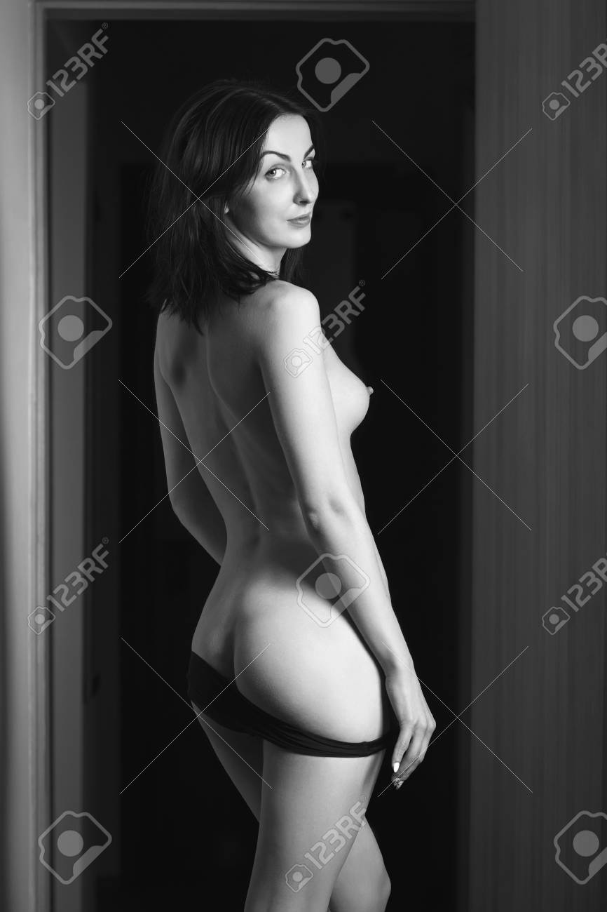 Naked Women Looking Behind Her