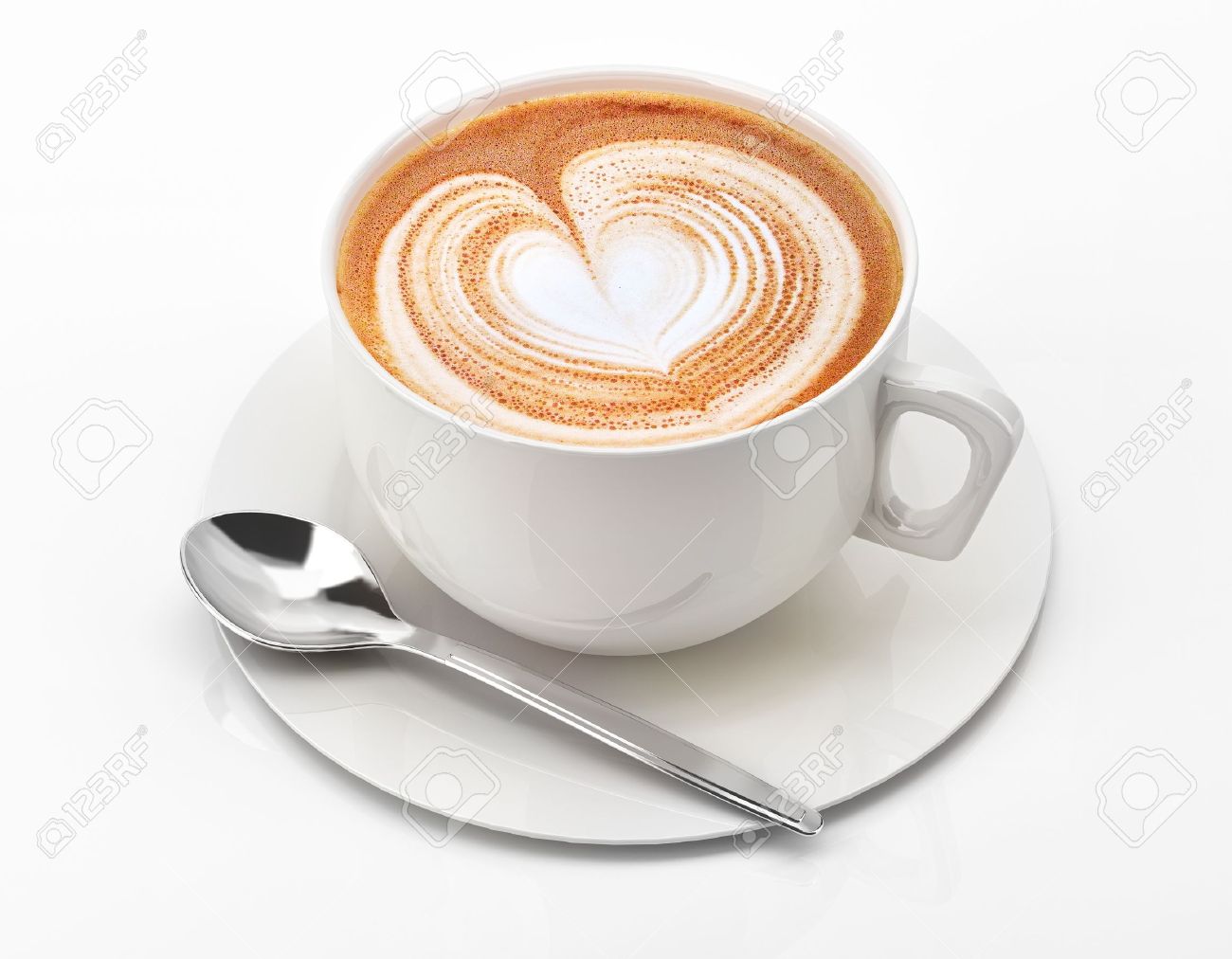 Cappuccino Mug Close Up With A Heart Decorated On Top Of Foam - Cappuccino Mug Close Up With A Heart Decorated On Top Of Foam On Whitebackground cappuccino mug close up with a heart decorated on top of foam - cappuccino mug close up with a heart decorated on top of foam on whitebackground