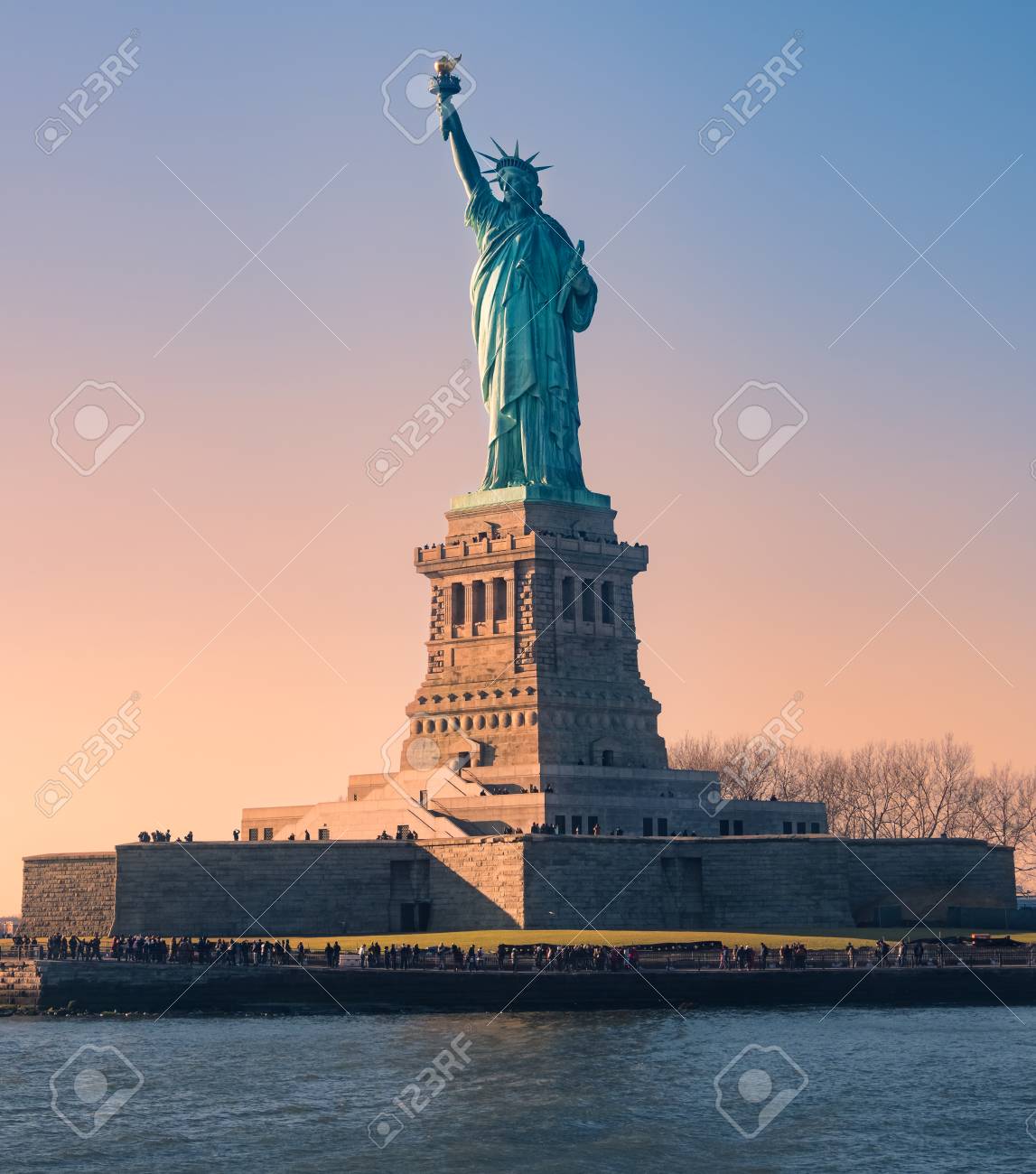 Statue of Liberty at sunset in Christmas, New York, USA - 105038727 Statue of Liberty at sunset in Christmas, New York, USA - 105038727
