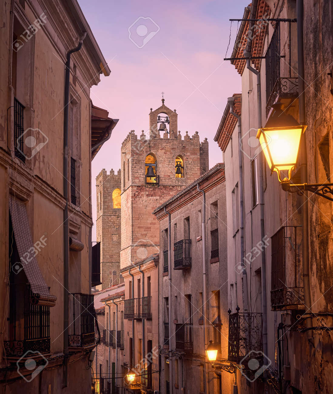 Historic architecture of the streets and tower of the Romanesque cathedral of the city of Siguenza, Guadalajara, Spain, at sunset - 157602593 Historic architecture of the streets and tower of the Romanesque cathedral of the city of Siguenza, Guadalajara, Spain, at sunset - 157602593