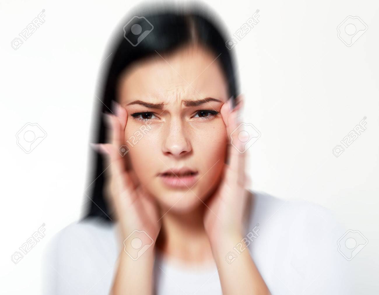 beautiful young woman over white with blurred vision and trouble focusing, trying to get focus on eyes with hands - 48976931 beautiful young woman over white with blurred vision and trouble focusing, trying to get focus on eyes with hands - 48976931