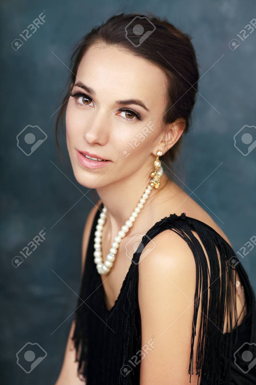 pearls and black dress
