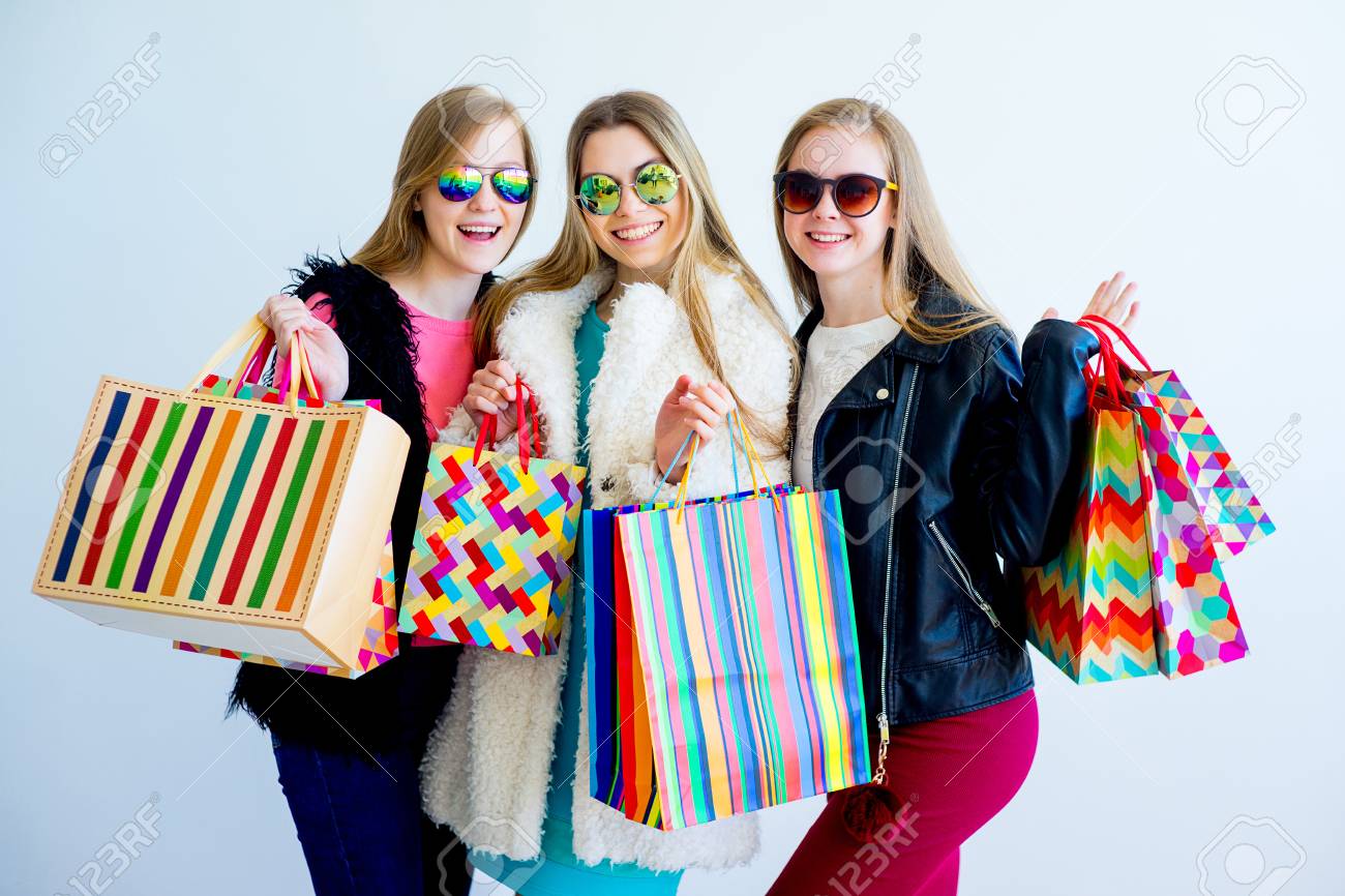 Three Girls Shopping Stock Photo, Picture And Royalty Free Image. Image  89082207.