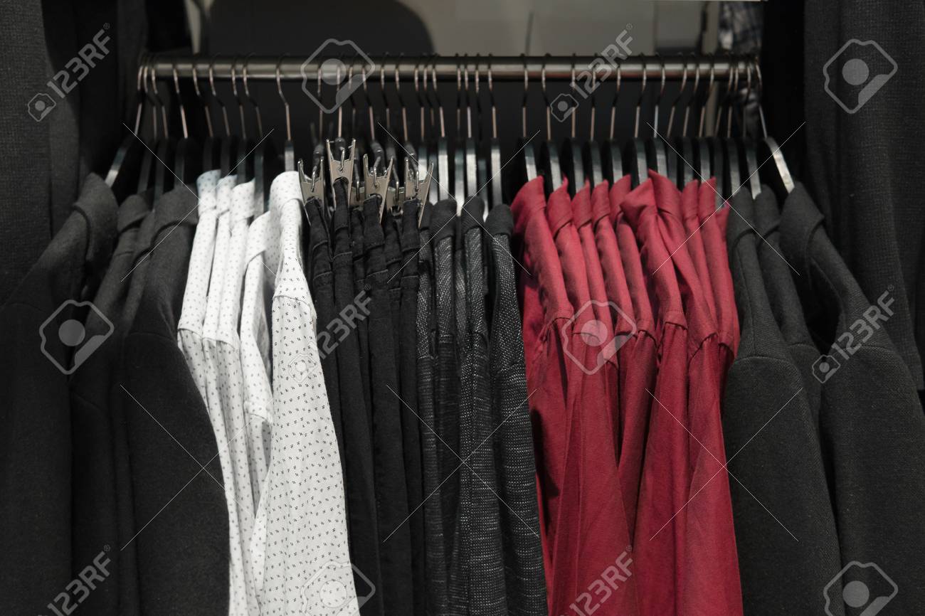 Classic Men Clothes Suits Shirts And Pants On The Racks In