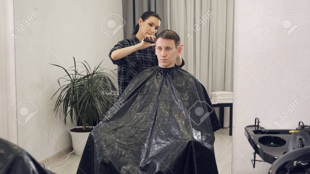 cutting hair with electric razor