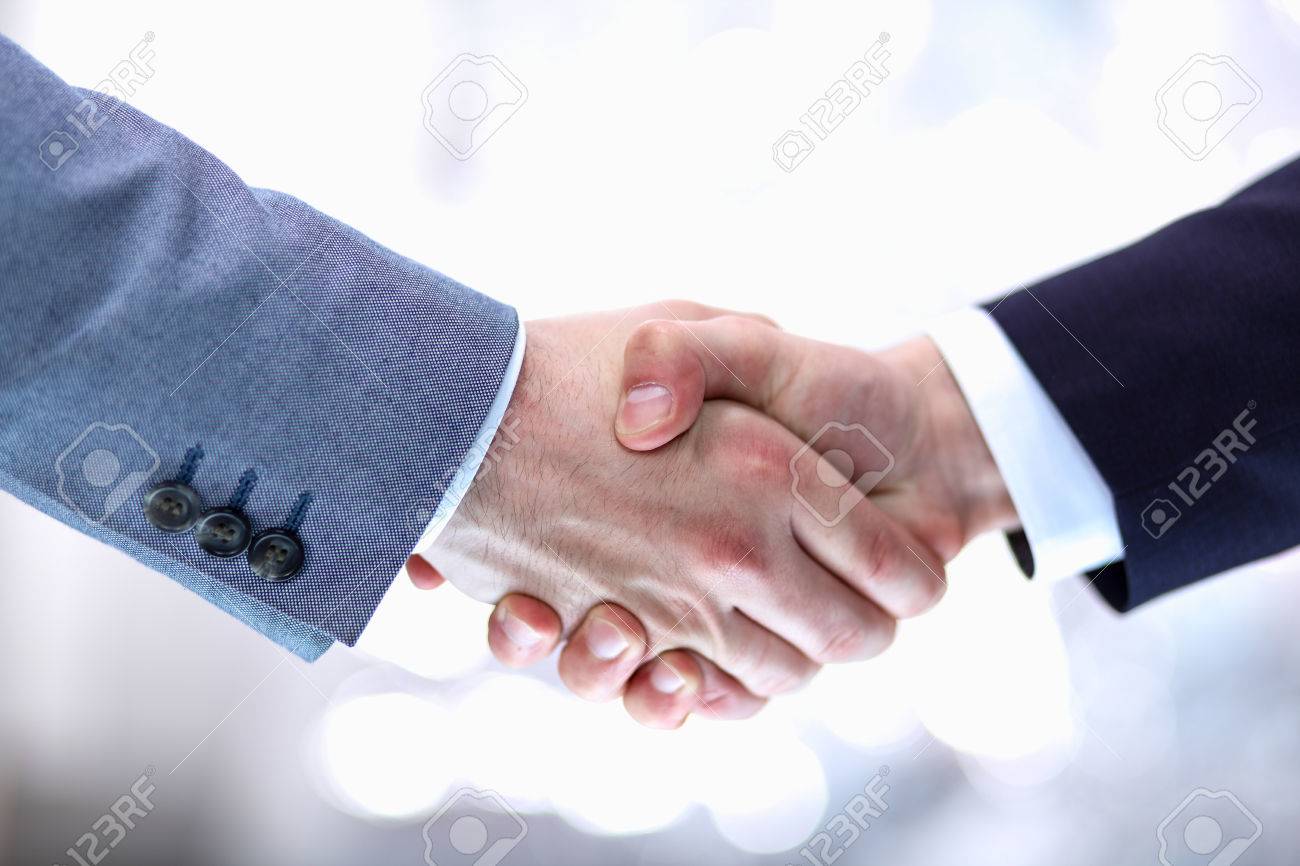 Businessmen shaking hands, isolated on white background. - 50336822 Businessmen shaking hands, isolated on white background. - 50336822