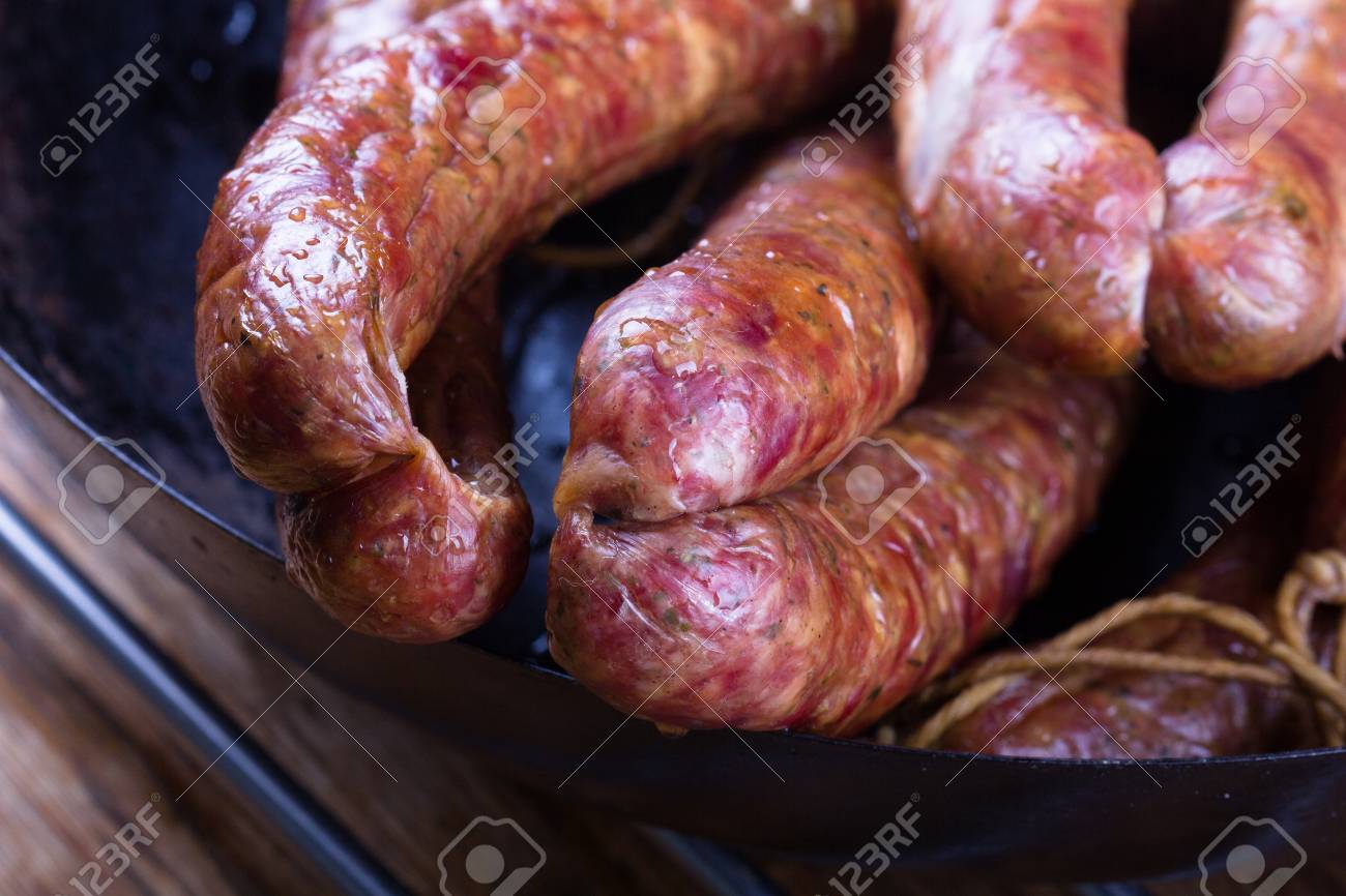 Traditional Polish pork sausages just taen from the smoker. - 76272028 Traditional Polish pork sausages just taen from the smoker. - 76272028
