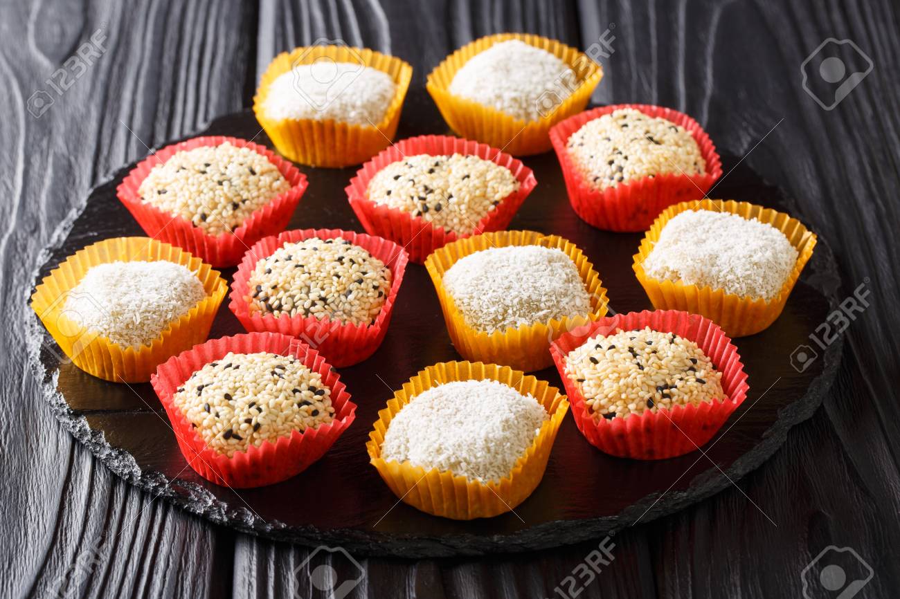 Japanese mochi rice cake. Stuffed with sweet bean jam on slate..