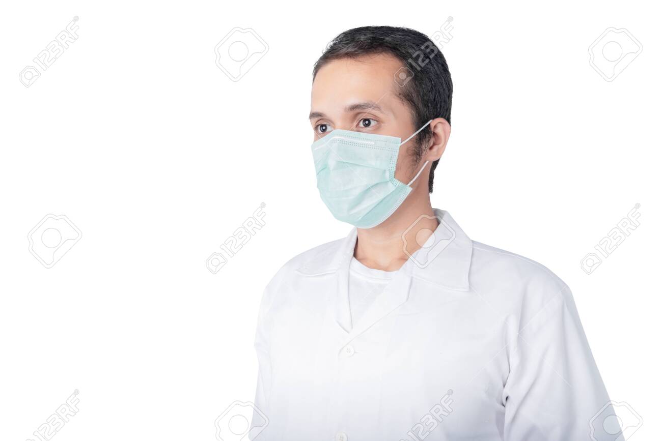 Asian man wearing a flu mask isolated over white background. Prevent flu disease Coronavirus - 142121296 Asian man wearing a flu mask isolated over white background. Prevent flu disease Coronavirus - 142121296