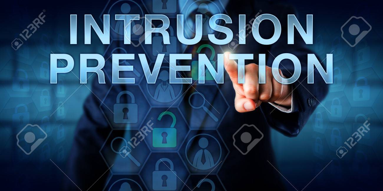 network administrator is pressing intrusion prevention on a touch screen interface information technology and security