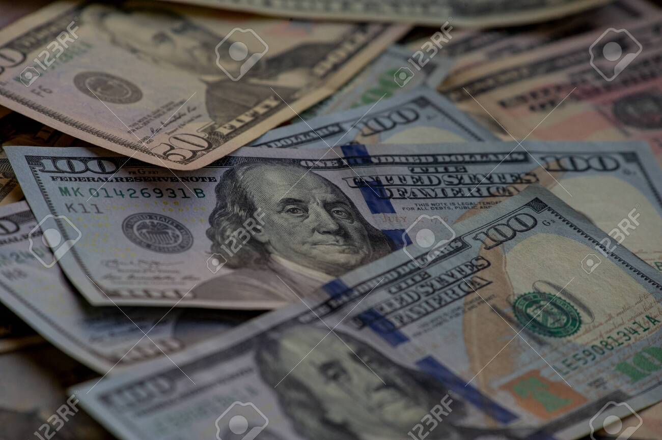 dollars background. Dollars background. Background of different us dollar banknotes. Finance concept. - 143737361 dollars background. Dollars background. Background of different us dollar banknotes. Finance concept. - 143737361