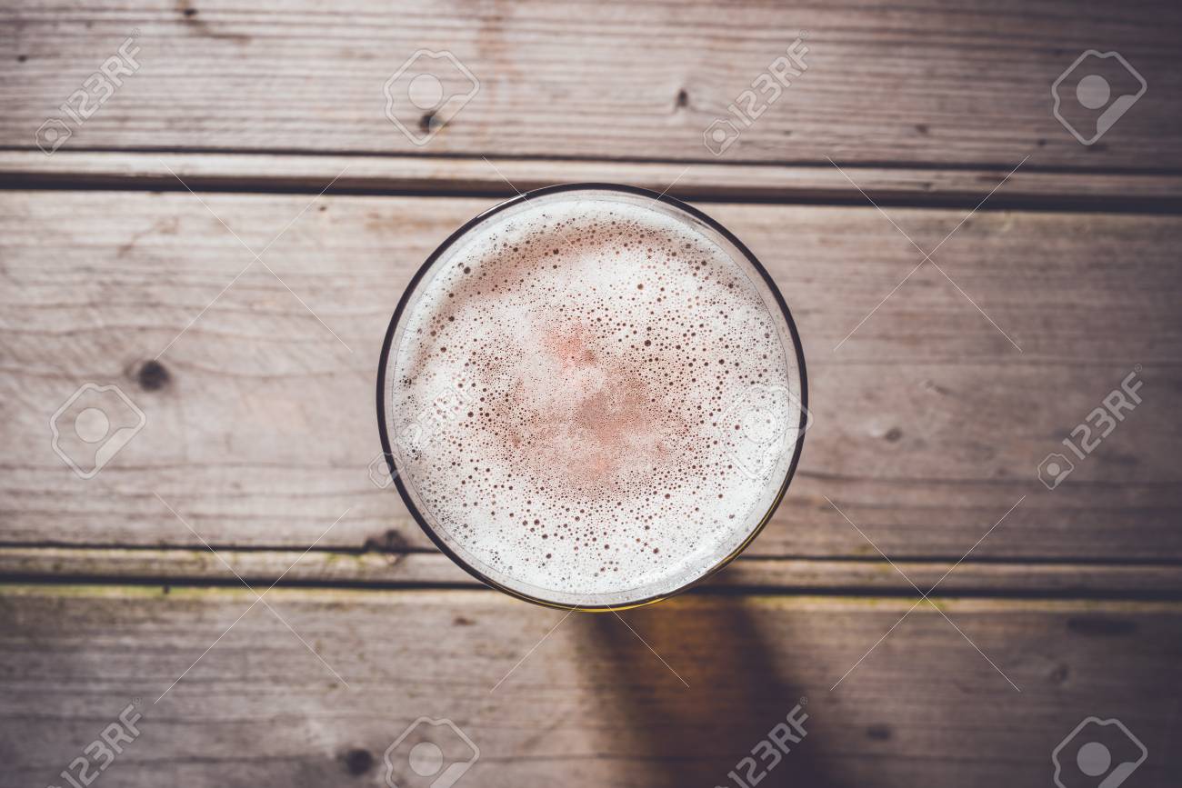 glass table top view glass of beer on an old wooden table top view stock photo 66843568 of beer on an old wooden table view photo picture glass table top view glass of beer on an old wooden table top view stock photo 66843568 of beer on an old wooden table view photo picture