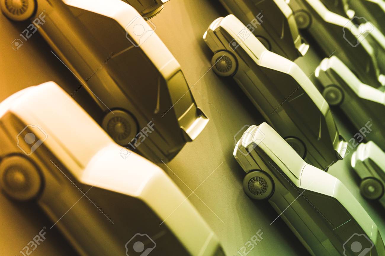 背景と等間隔に並んで同一の車の質感 斜めの構図 オレンジ色とグリーン の写真素材 画像素材 Image